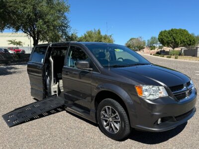 Grey Dodge Grand Caravan with BraunAbility Side Entry Automatic Fold Out conversion