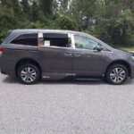 Brown Honda Odyssey with Vantage Mobility Side Entry Automatic In Floor conversion