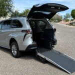 Silver Toyota Sienna with Driverge Rear Entry Manual Fold Out conversion