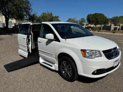 White Dodge Grand Caravan with Vantage Mobility Side Entry Automatic In Floor conversion
