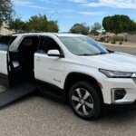 White Chevrolet Traverse with BraunAbility Side Entry Automatic In Floor conversion
