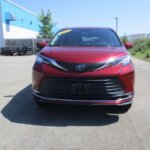 Red Toyota Sienna with BraunAbility Side Entry Automatic Fold Out conversion