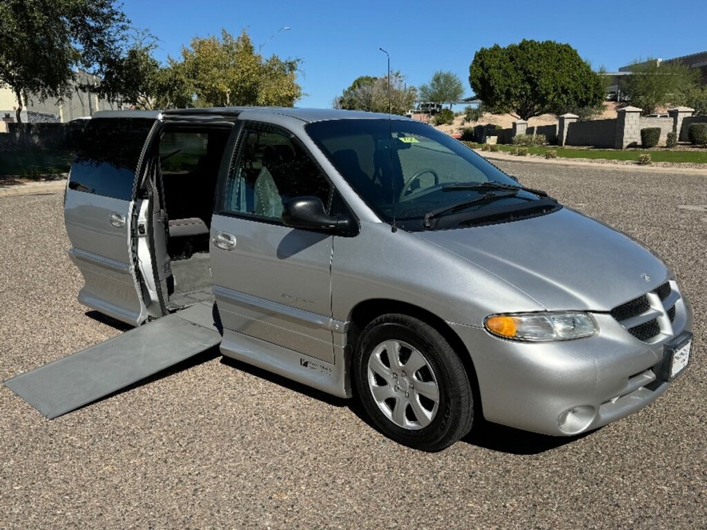 Silver Dodge Grand Caravan with Vantage Mobility Side Entry Automatic In Floor conversion
