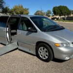 Silver Dodge Grand Caravan with Vantage Mobility Side Entry Automatic In Floor conversion