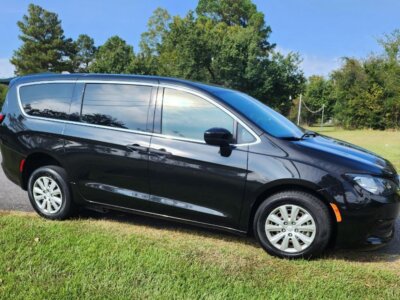 Black Chrysler Voyager with ATS Rear Entry Manual Fold Out conversion