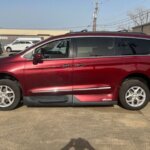 Red Chrysler Pacifica with Vantage Mobility Side Entry Automatic In Floor conversion