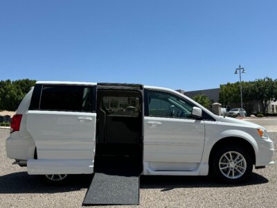 White Dodge Grand Caravan with Vantage Mobility Side Entry Automatic In Floor conversion