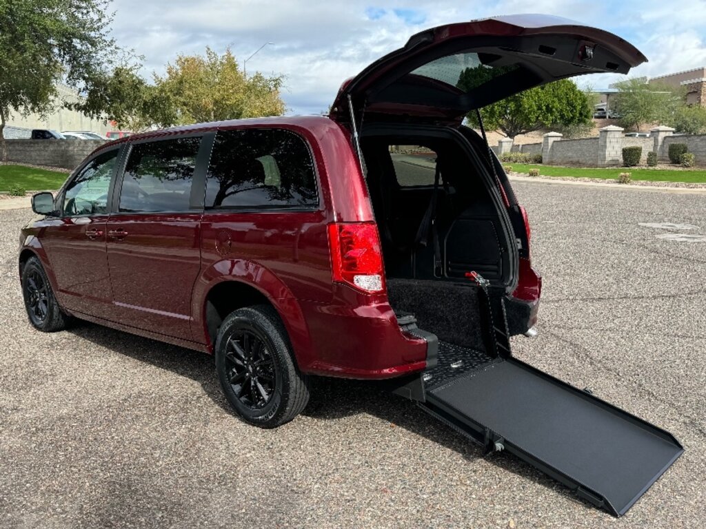 Red Dodge Grand Caravan with ATS Rear Entry Manual Fold Out conversion
