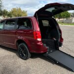 Red Dodge Grand Caravan with ATS Rear Entry Manual Fold Out conversion