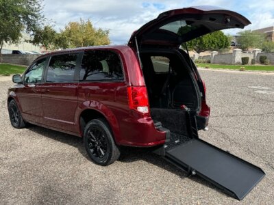 Red Dodge Grand Caravan with ATS Rear Entry Manual Fold Out conversion