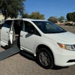 White Honda Odyssey with Vantage Mobility Side Entry Automatic In Floor conversion