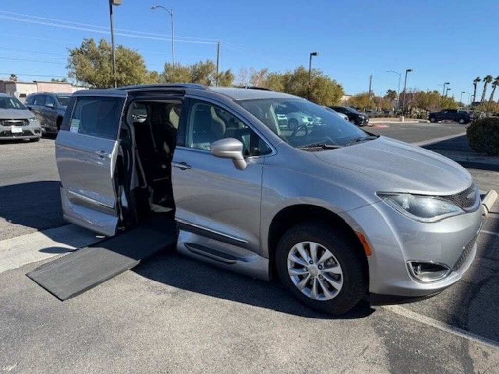 Silver Chrysler Pacifica with Vantage Mobility Side Entry Automatic In Floor conversion