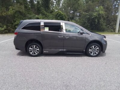 Brown Honda Odyssey with Vantage Mobility Side Entry Automatic In Floor conversion