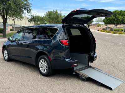 Blue Chrysler Pacifica with Driverge Rear Entry Manual Fold Out conversion