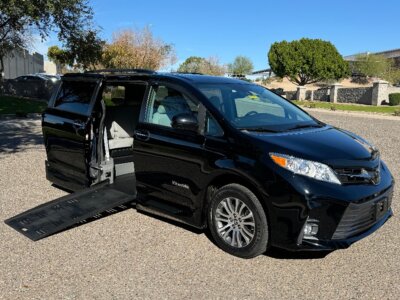 Black Toyota Sienna with BraunAbility Side Entry Automatic Fold Out conversion
