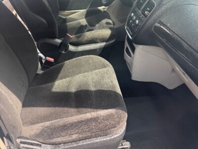 Silver Dodge Grand Caravan with Vantage Mobility Side Entry Manual In Floor conversion