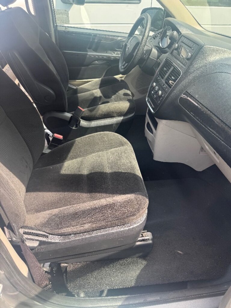 Silver Dodge Grand Caravan with Vantage Mobility Side Entry Manual In Floor conversion