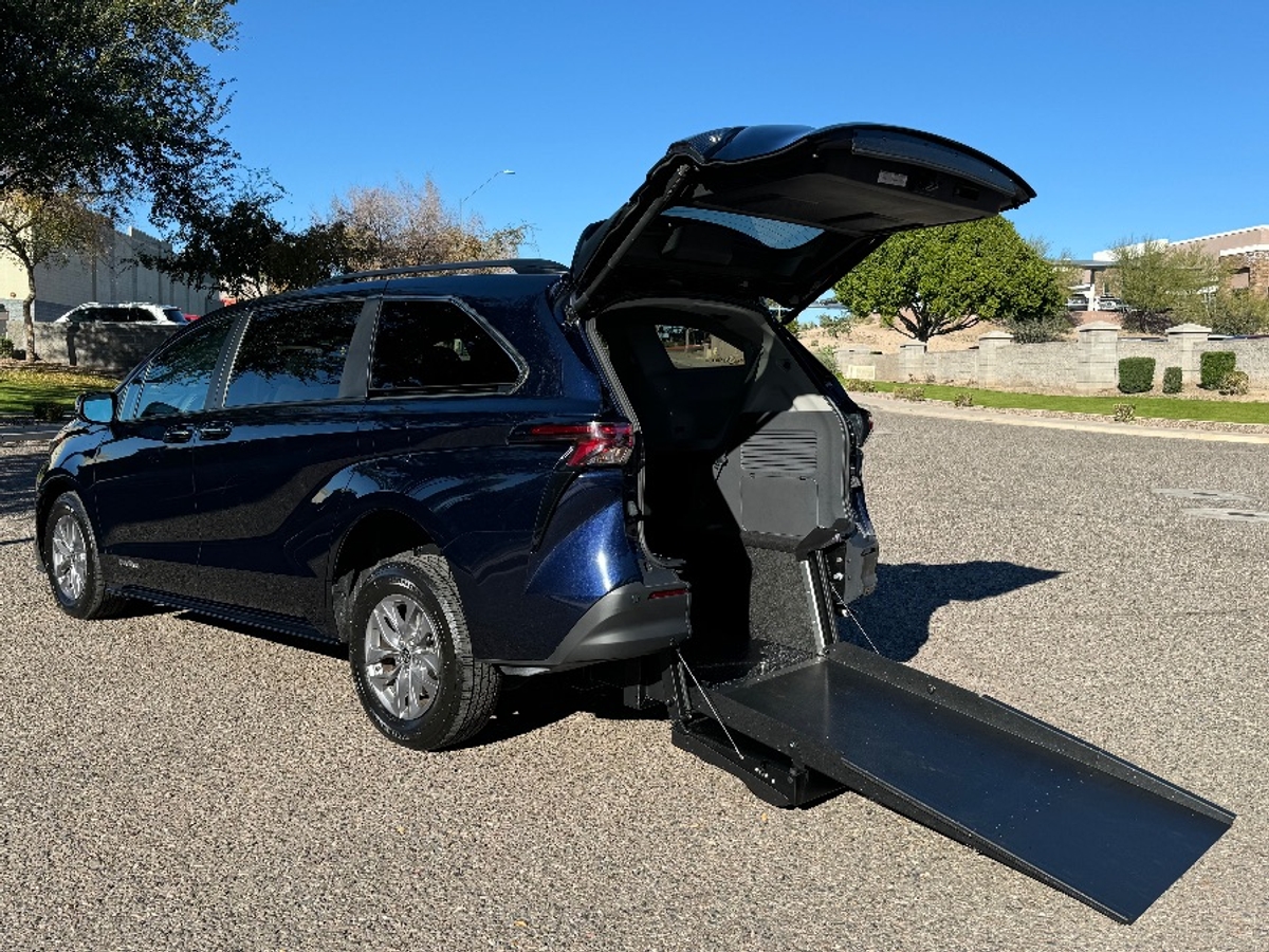 Blue Toyota Sienna with Driverge Rear Entry Manual Fold Out conversion