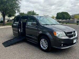 Grey Dodge Grand Caravan with BraunAbility Side Entry Automatic Fold Out conversion