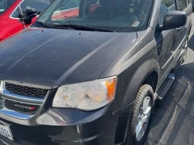 Grey Dodge Grand Caravan with Vantage Mobility Side Entry Manual In Floor conversion