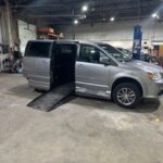 Silver Dodge Grand Caravan with BraunAbility Side Entry Automatic Fold Out conversion