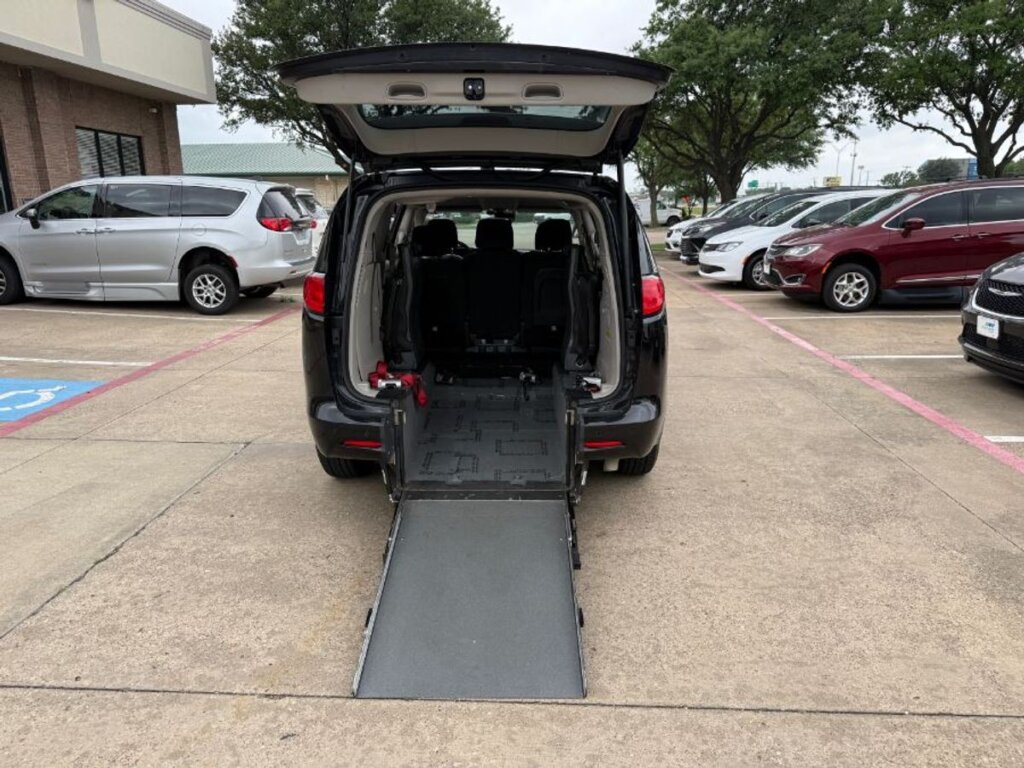 Black Chrysler Voyager with Driverge Rear Entry Manual Fold Out conversion