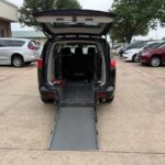 Black Chrysler Voyager with Driverge Rear Entry Manual Fold Out conversion