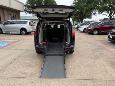 Black Chrysler Voyager with Driverge Rear Entry Manual Fold Out conversion