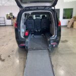 Black Chrysler Pacifica with Driverge Rear Entry Manual Fold Out conversion