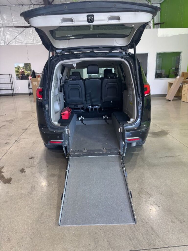 Black Chrysler Pacifica with Driverge Rear Entry Manual Fold Out conversion