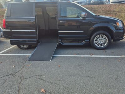 Black Chrysler Town and Country with Vantage Mobility Side Entry Automatic In Floor conversion
