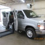 Silver Ford Econoline with Other Side Entry Automatic Fold Out conversion