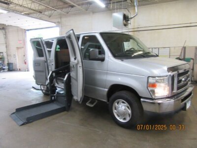 Silver Ford Econoline with Other Side Entry Automatic Fold Out conversion