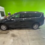 Black Chrysler Pacifica with Driverge Rear Entry Manual Fold Out conversion