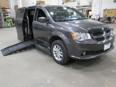 Grey Dodge Grand Caravan with BraunAbility Side Entry Automatic Fold Out conversion