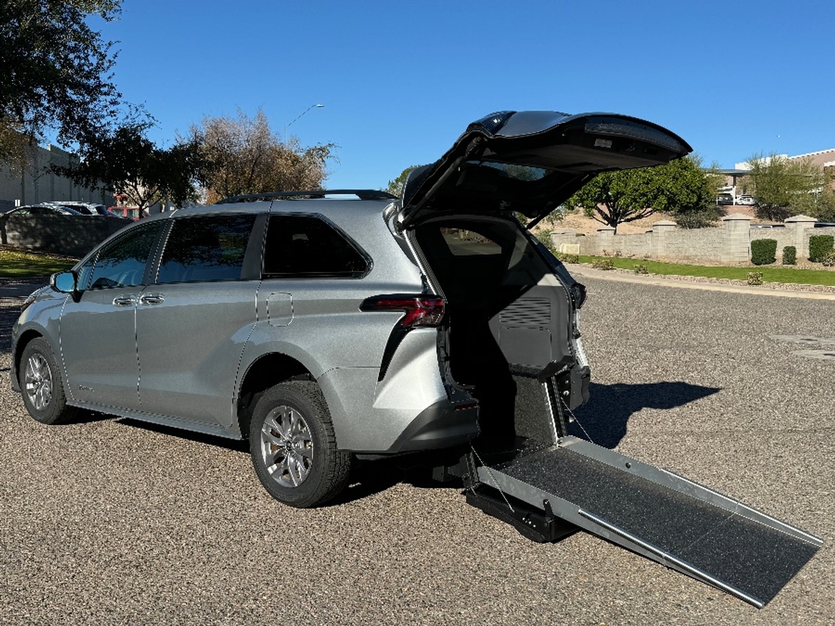Silver Toyota Sienna with Driverge Rear Entry Manual Fold Out conversion