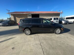 Black Chrysler Pacifica with Driverge Rear Entry Manual Fold Out conversion