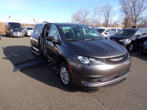 Grey Chrysler Voyager with BraunAbility Side Entry Automatic Fold Out conversion