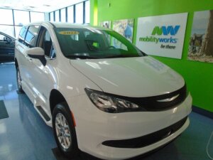 White Chrysler Voyager with BraunAbility Side Entry Automatic Fold Out conversion