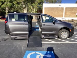 Grey Chrysler Voyager with BraunAbility Side Entry Automatic Fold Out conversion