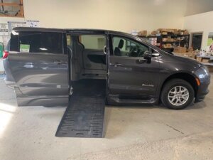 Grey Chrysler Voyager with BraunAbility Side Entry Automatic Fold Out conversion