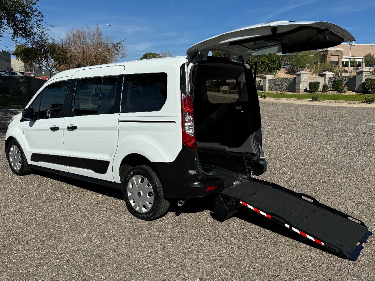 White Ford Transit Connect with Driverge Rear Entry Manual Fold Out conversion