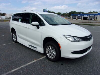 White Chrysler Voyager with Vantage Mobility Side Entry Automatic In Floor conversion