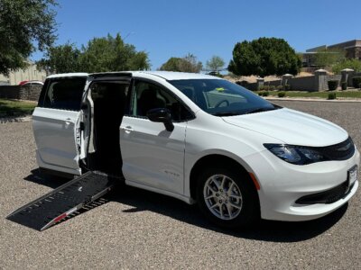 White Chrysler Voyager with Driverge Side Entry Automatic Fold Out conversion