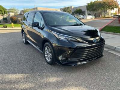Black Toyota Sienna with Driverge Rear Entry Manual Fold Out conversion