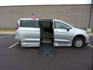 Silver Chrysler Voyager with BraunAbility Side Entry Automatic Fold Out conversion