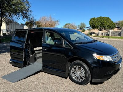 Black Honda Odyssey with Vantage Mobility Side Entry Automatic In Floor conversion