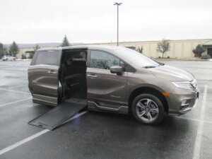 Grey Honda Odyssey with BraunAbility Side Entry Automatic In Floor conversion