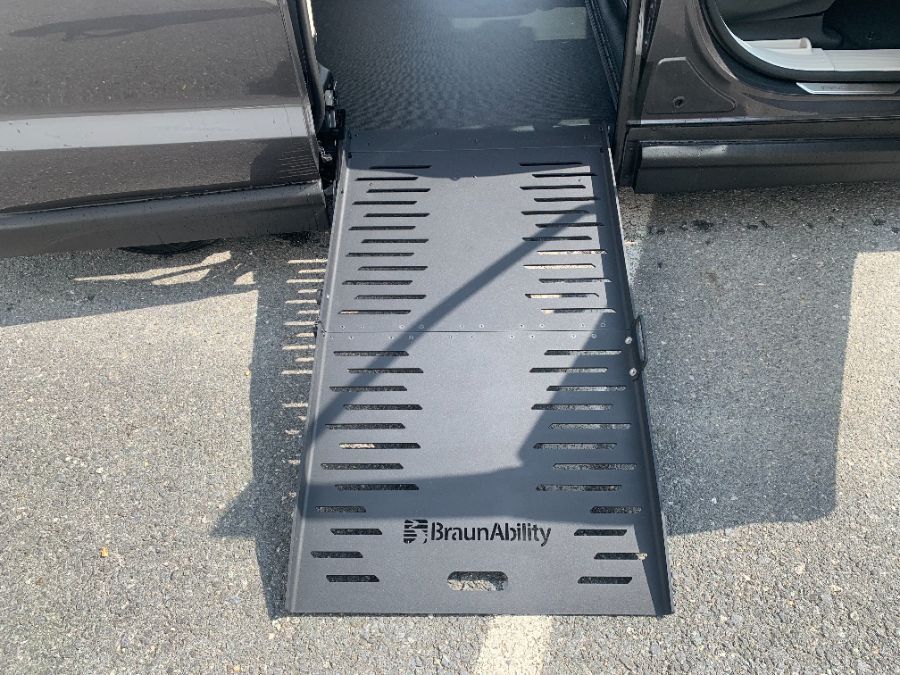 Grey Chrysler Voyager with BraunAbility Side Entry Manual Fold Out conversion