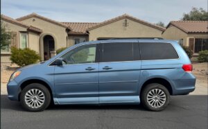Blue Honda Odyssey with Vantage Mobility Side Entry Automatic In Floor conversion